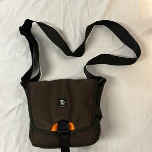 Crumpler Brown Canvas Crossbody Bag with Orange Accent
